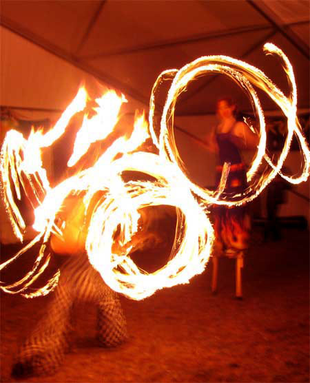 fire fans and fire poi on stilts for the national Celtic festival in Australia