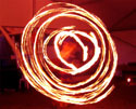 fire hula hoop girl entertains with our indoor fire show