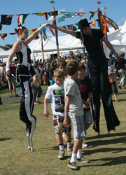 stilt walkers performance at a folk festival, Australia